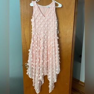 Pale pink party dress with 3D flowers